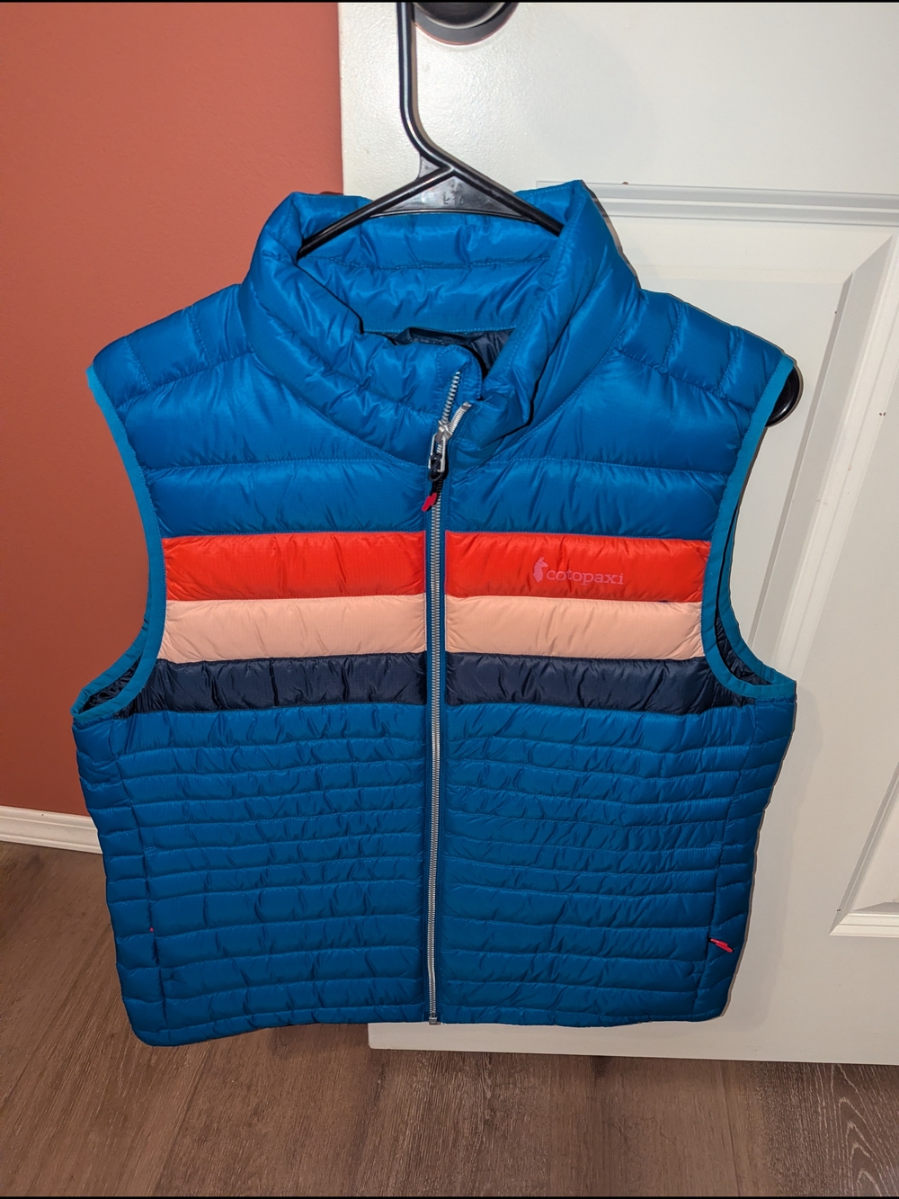 cotopaxi Kids Blue Quilted Puffer Vest with Red, Peach and Navy Stripes